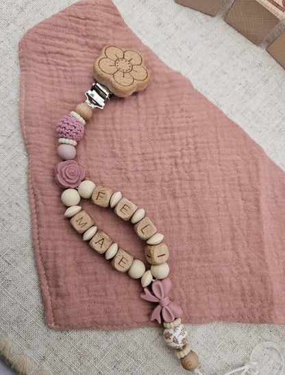 Personalisierte Schnullerkette mit Namen – Baby Mädchen rosa - Schleife - Holzbuchstaben