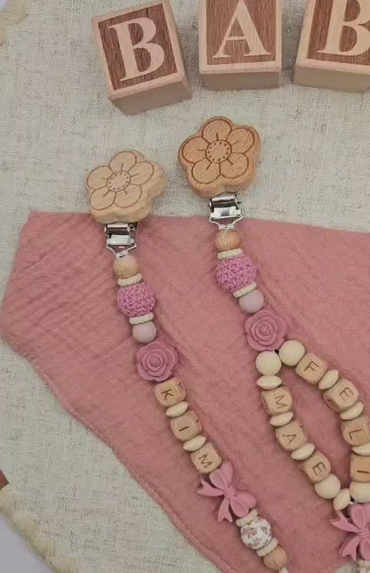 Personalisierte Schnullerkette mit Namen – Baby Mädchen rosa - Schleife - Holzbuchstaben